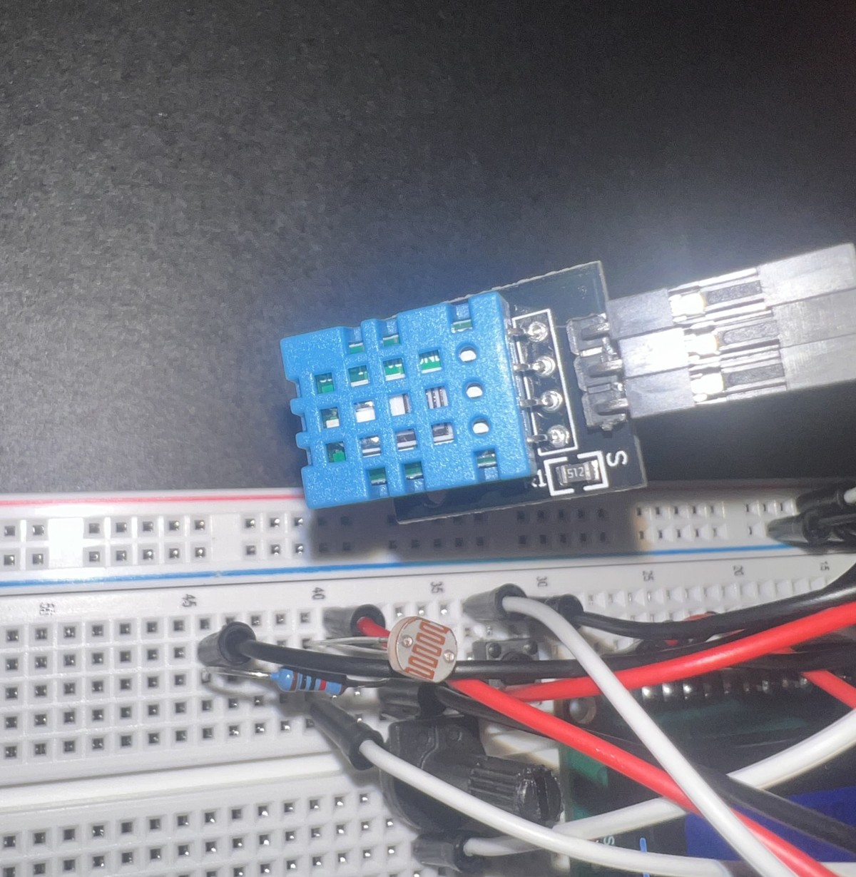DHT11 sensor and photoresistor on breadboard